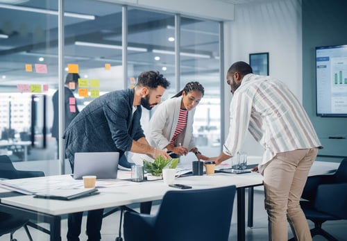 A group of people collaborating in a meeting