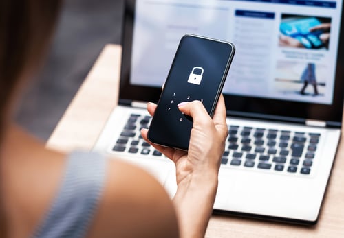 a person unlocking her phone