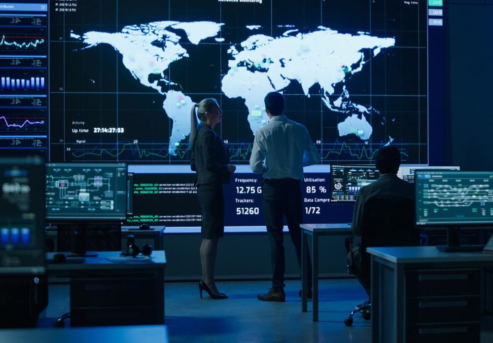 large projected computer screen of a world map