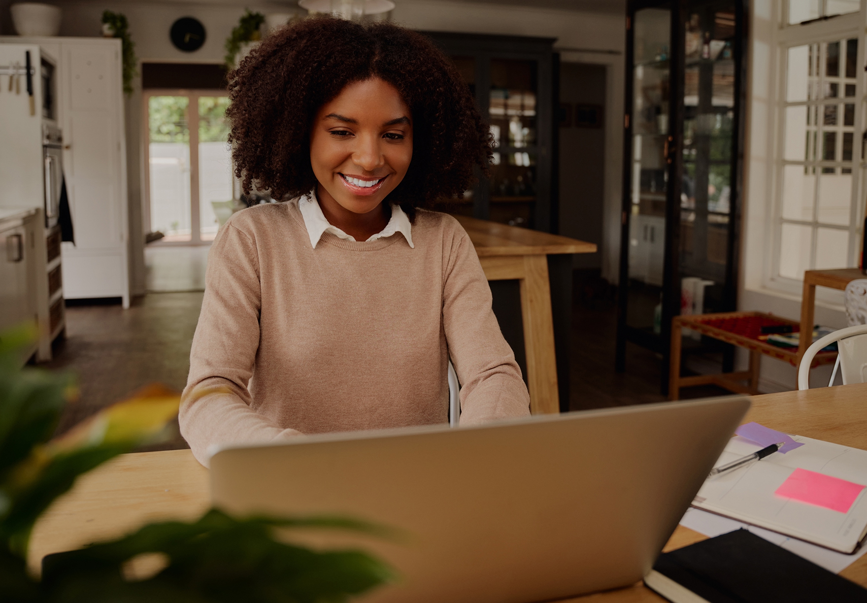 Smiling remote worker happy with her new remote job