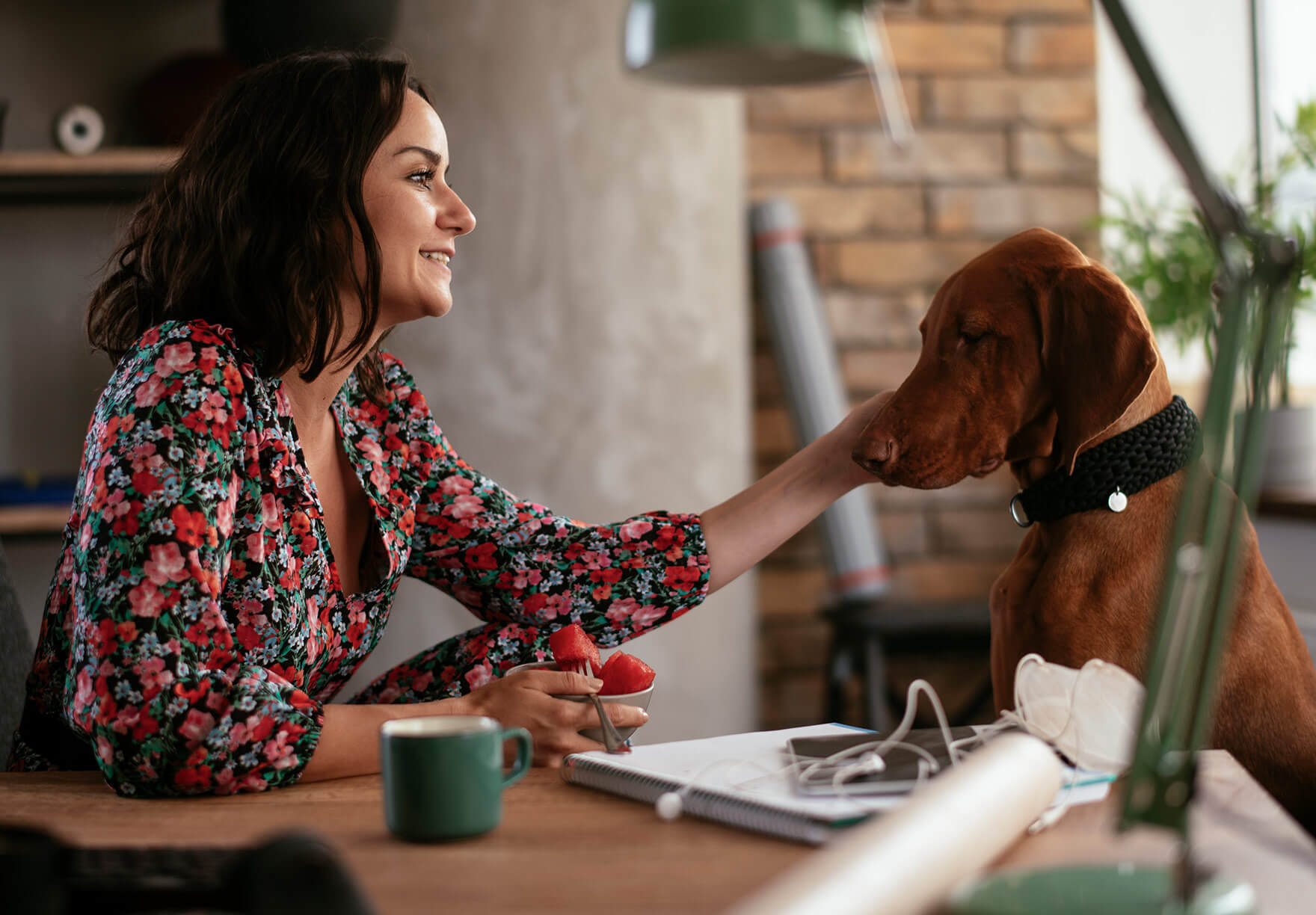 Woman with dog in co-working space