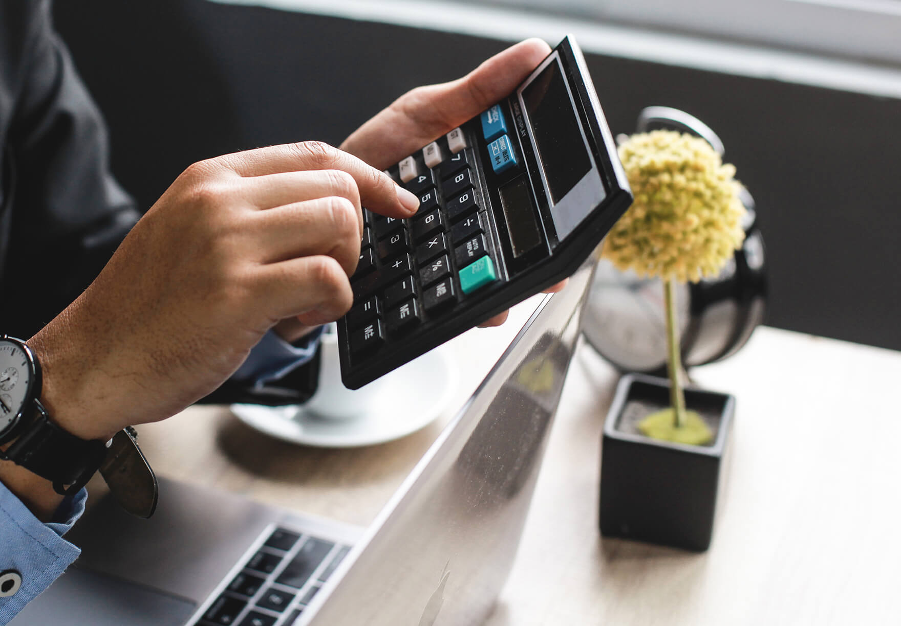 person using a calculator