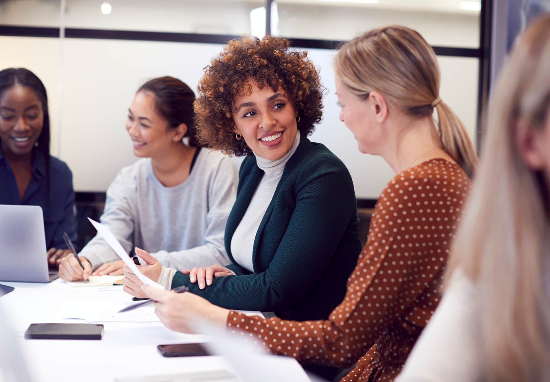 Women collaborating around a table